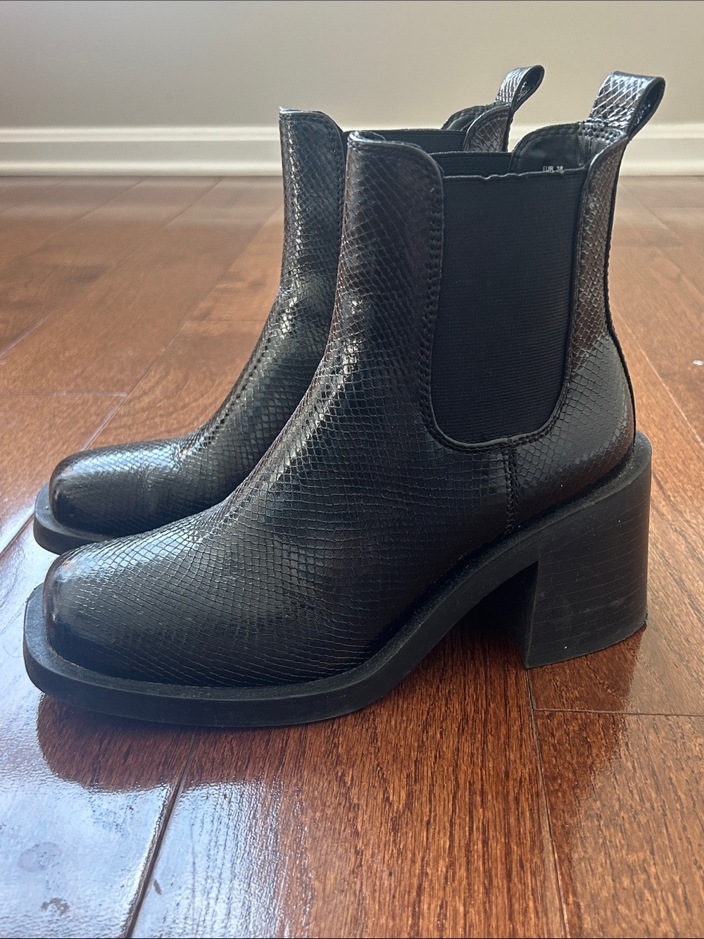 Black Snakeskin Chelsea Ankle Boots